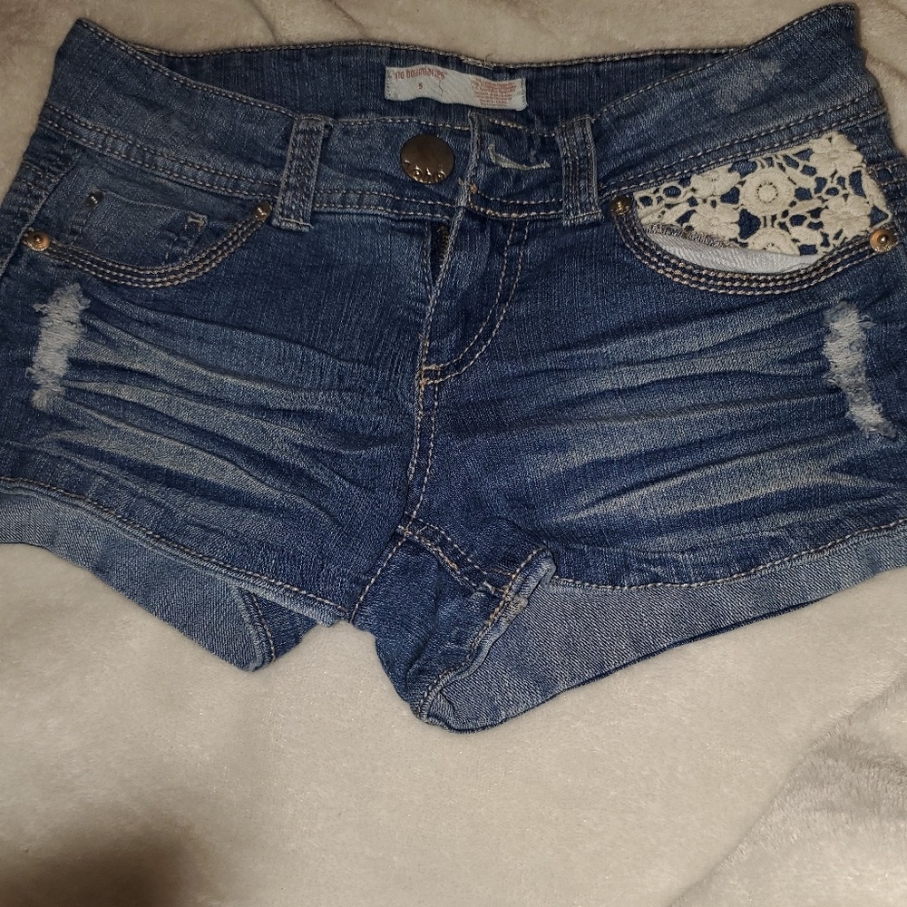 Distressed denim shorts